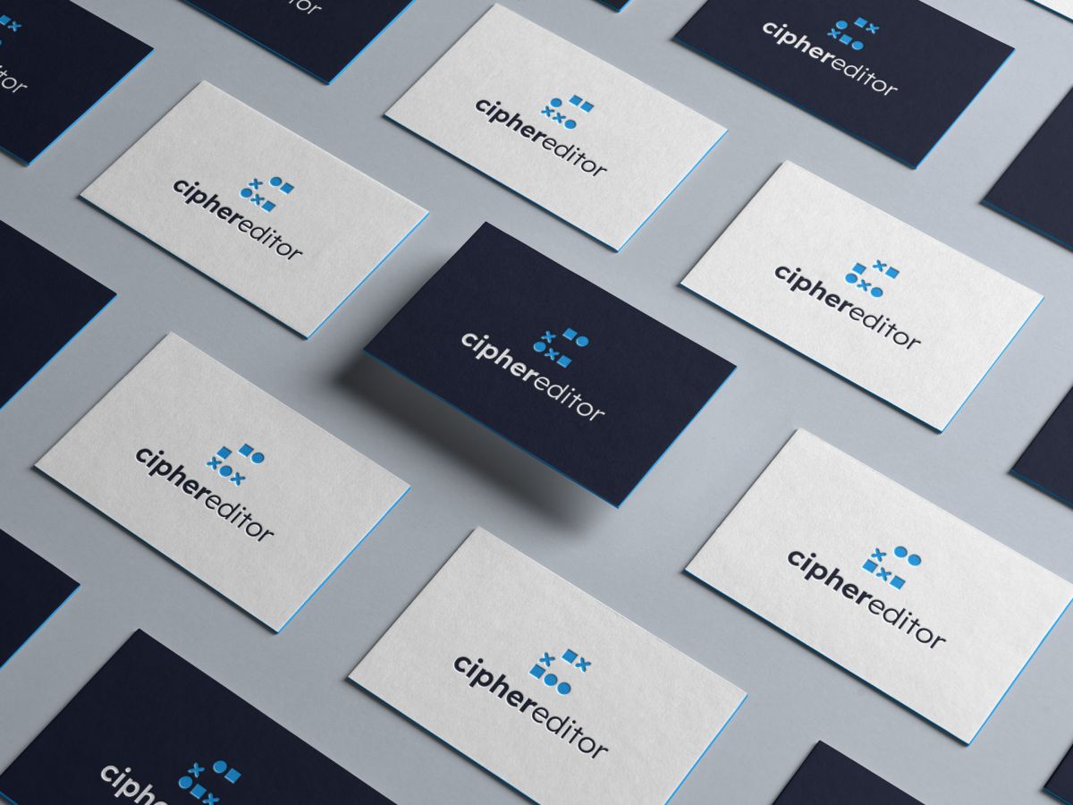 Business cards from ciphereditor showing different variations of the logo.
