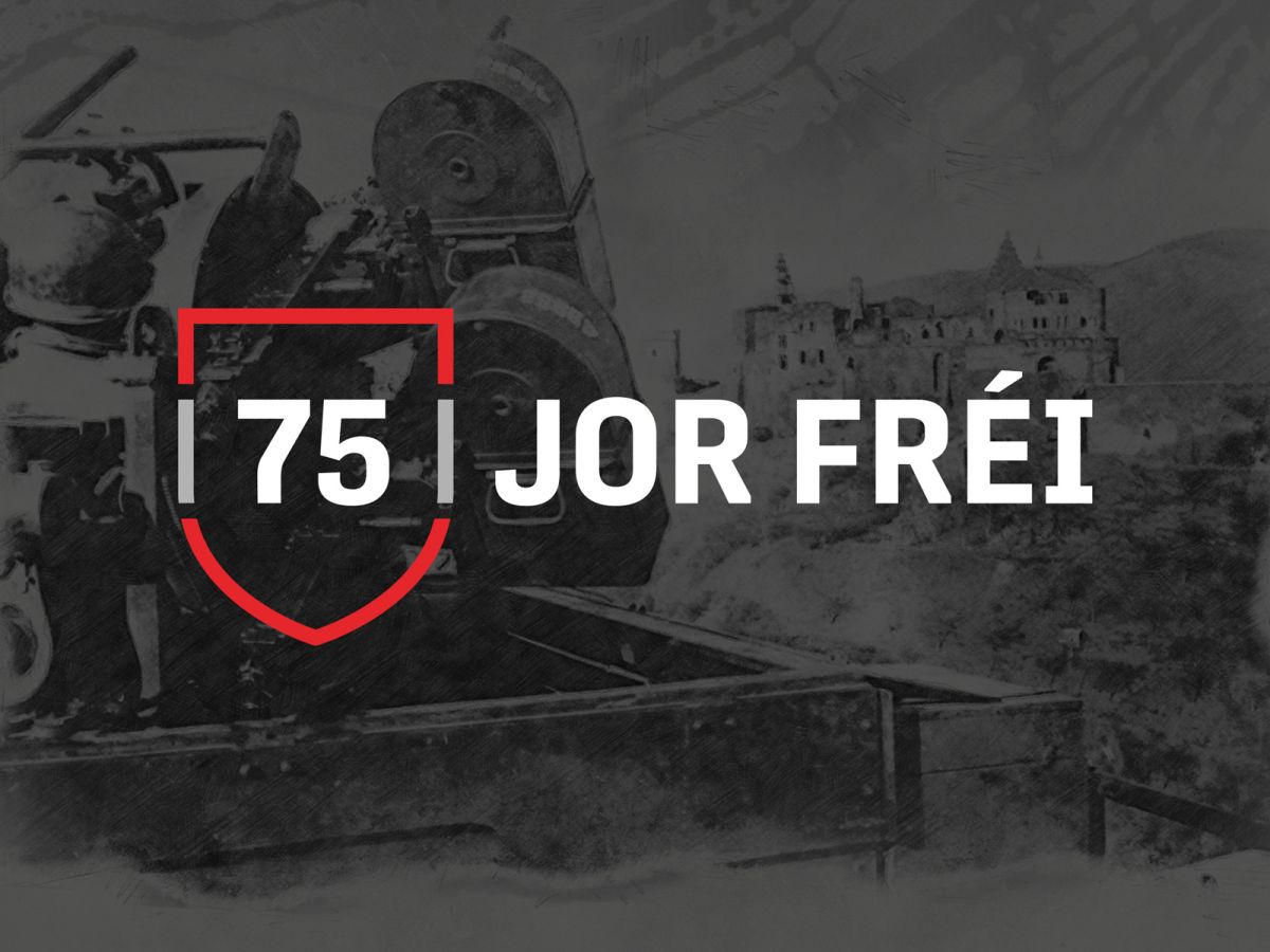 Logo for the 75th anniversary of the liberation of Vianden by the Americans in World War 2, showing a minimalist coat of arms of Vianden and containing the saying "75 years free" in the Vianden dialect.