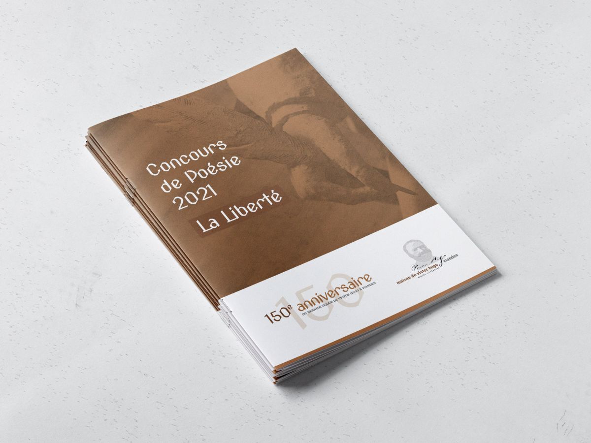 Brochure with various poems collected during a poetry competition on the occasion of the anniversary.