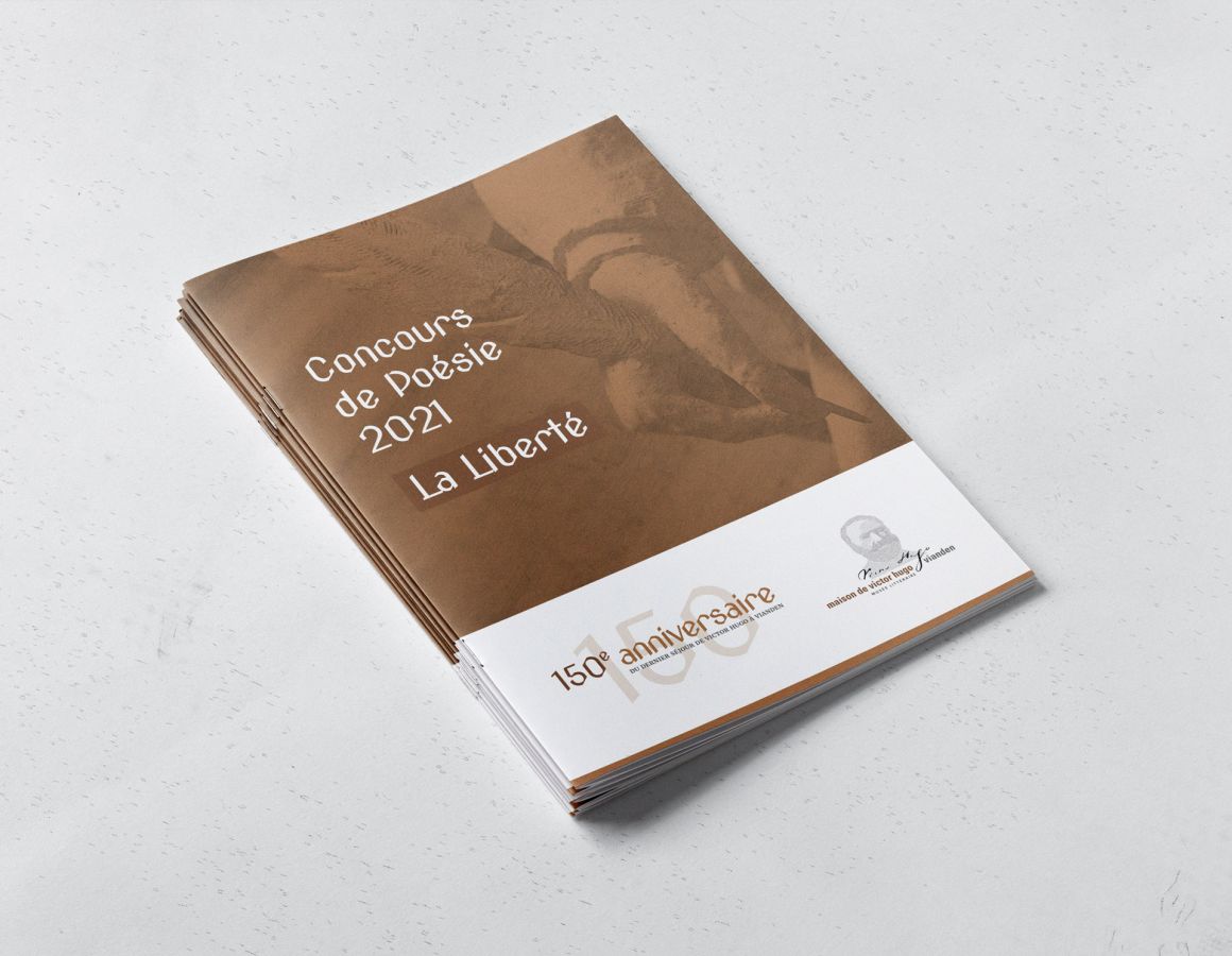Brochure with various poems collected during a poetry competition on the occasion of the anniversary.